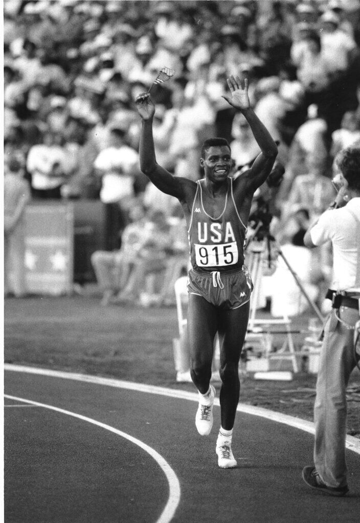 1984: Carl Lewis wins 100-meter dash in 9.99 seconds at Los Angeles Summer Games